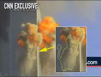 No detalhe, sobre captura de video da TV CNN,  destacado o suposto ser demonaco nas chamas do World Trade Center de New York